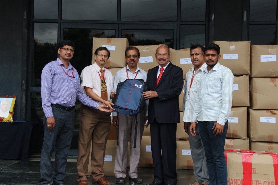 Distribution of school bags and notebooks among flood affected school children