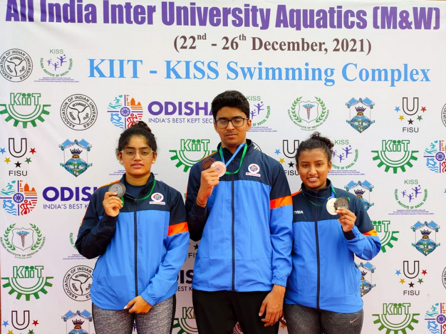 Hefty medal tally at aquatic competition for PES University swimming team