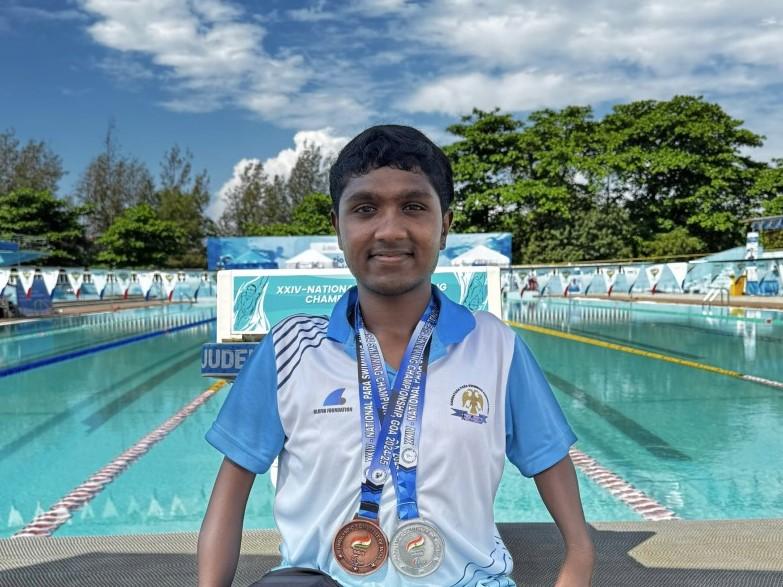Student achievement: Naveen swims to glory